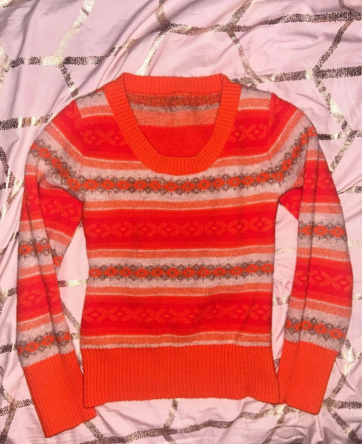 orange pattern sweater