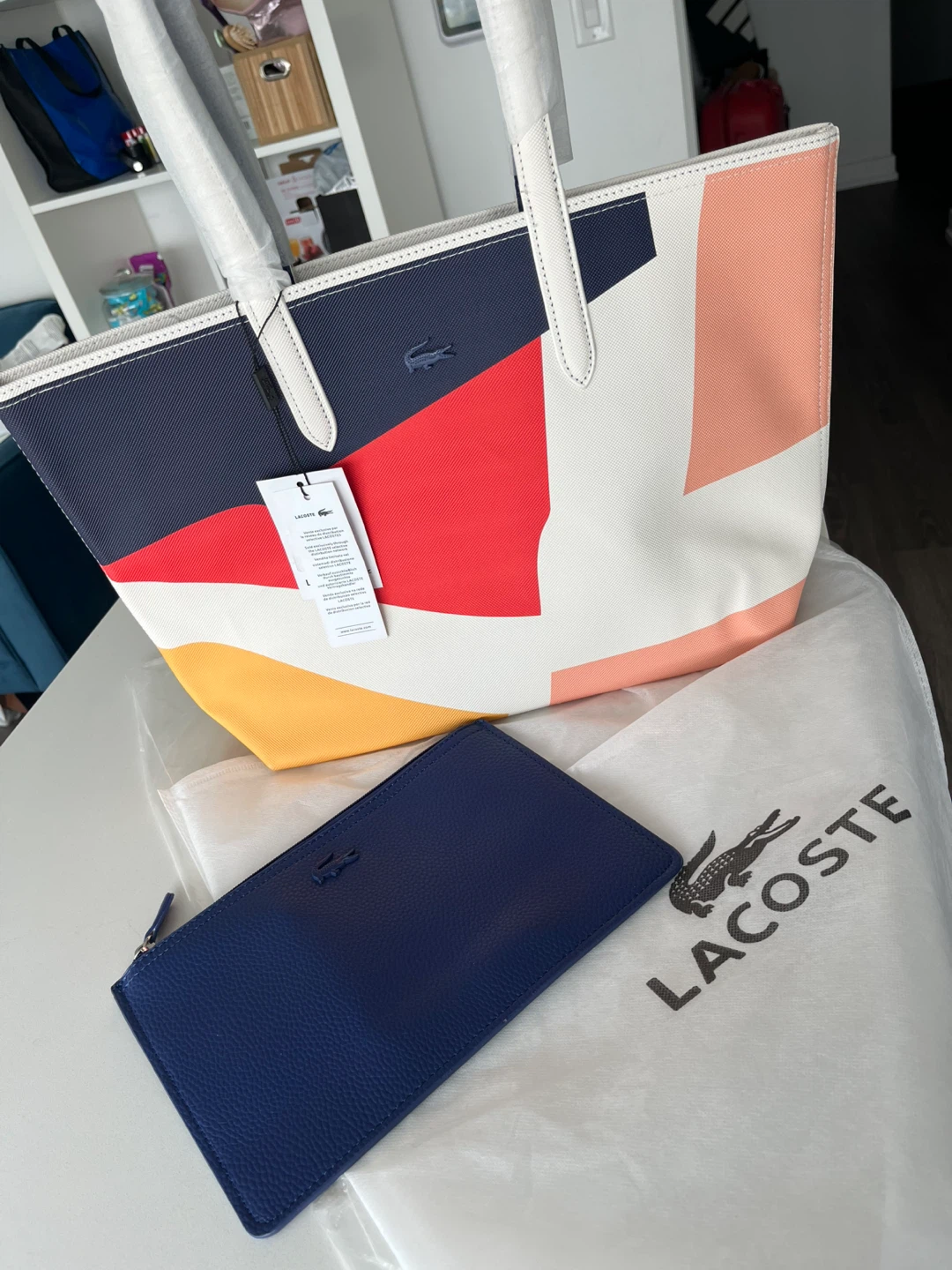 Reversible la coste tote bag.