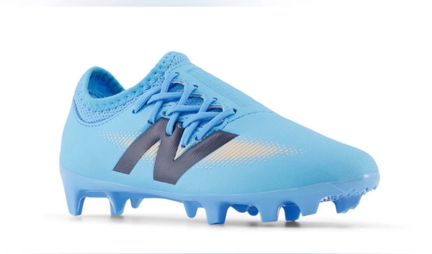 New Balance cleats/junior 4