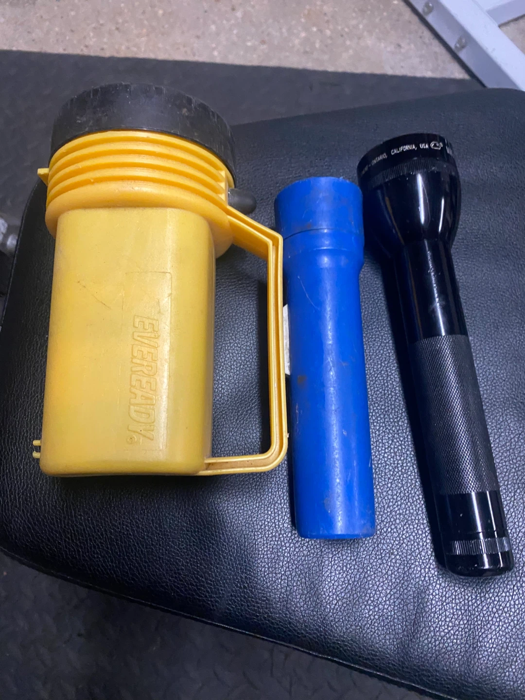 Eveready Yellow Flashlight & Maglite Black Flashlight
