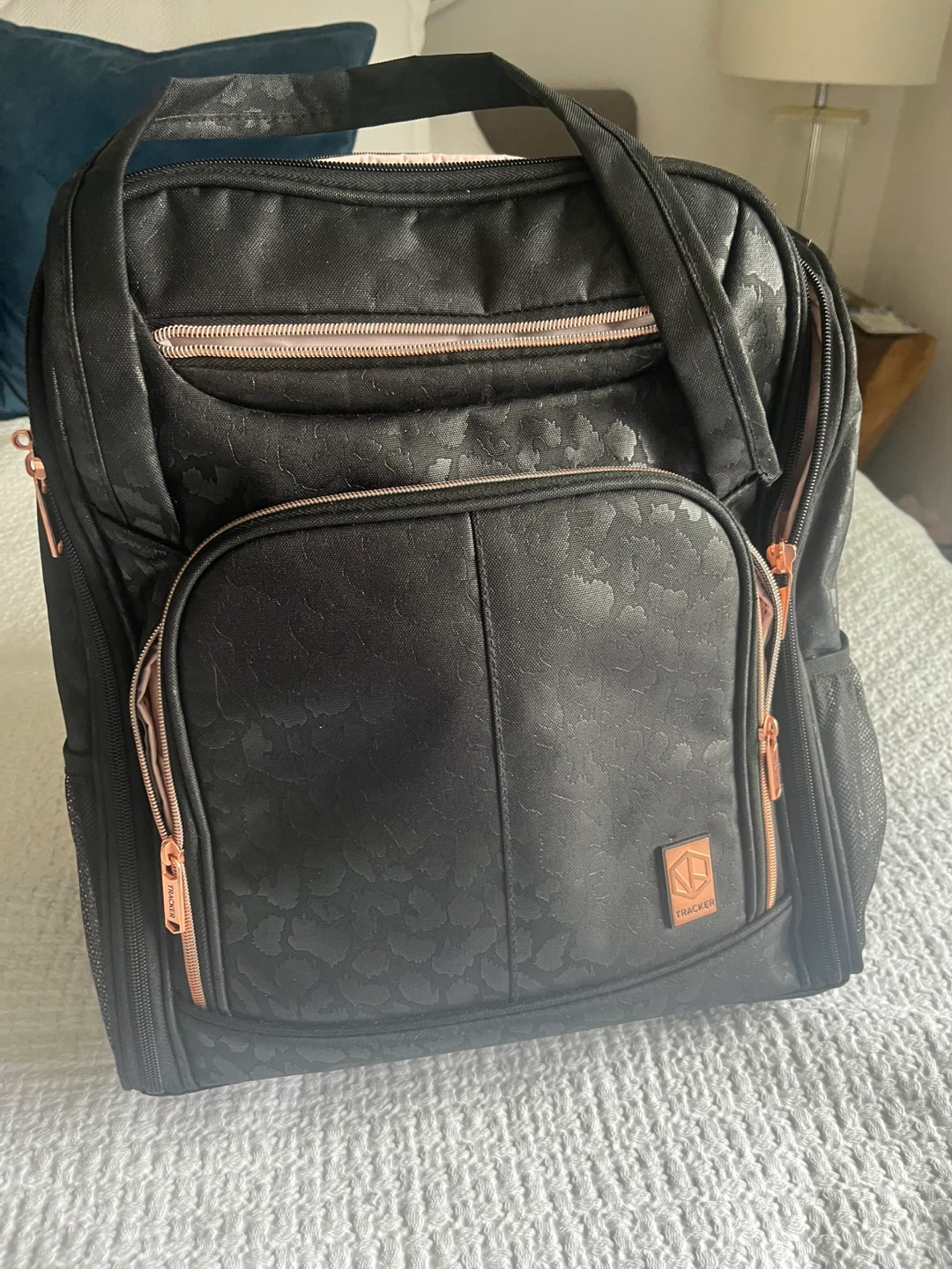 Tracker Black Leopard Print Rolling Backpack
