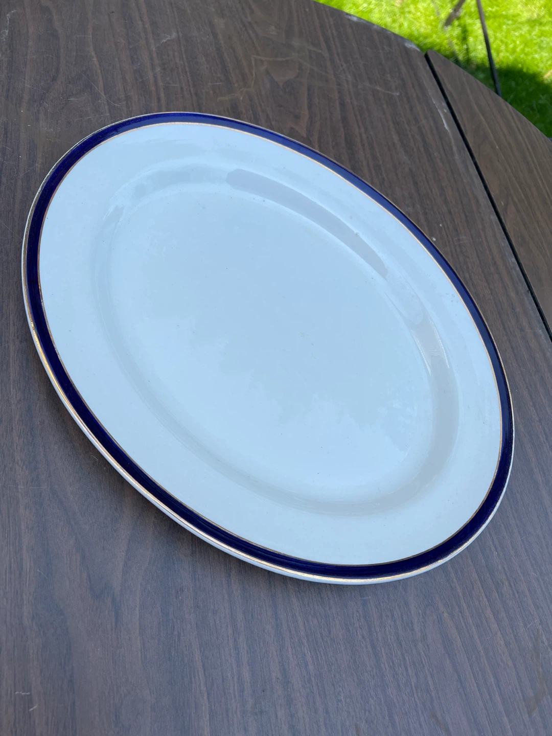 White Oval Platter with Blue and Gold Rim