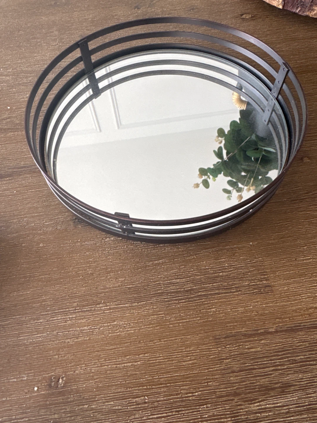 Round, mirrored table top decor