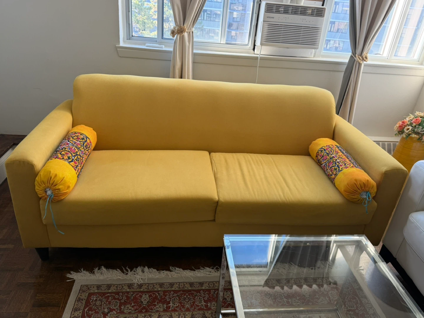 Yellow Sofa with Decorative Bolster Pillows