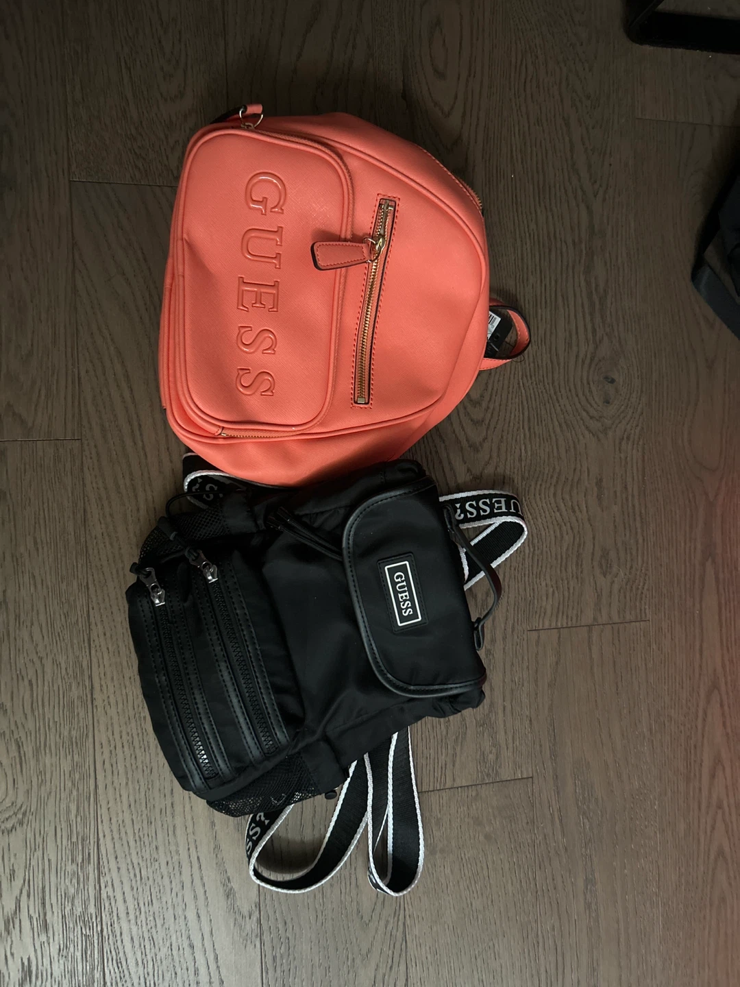 2 Guess Backpacks - Coral Pink and Black