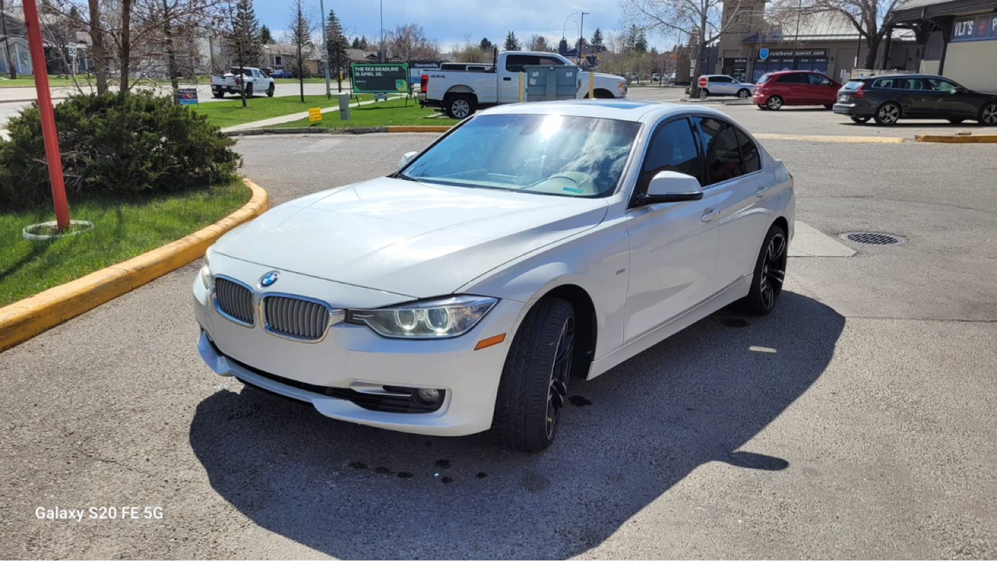 White BMW 328i Sedan
