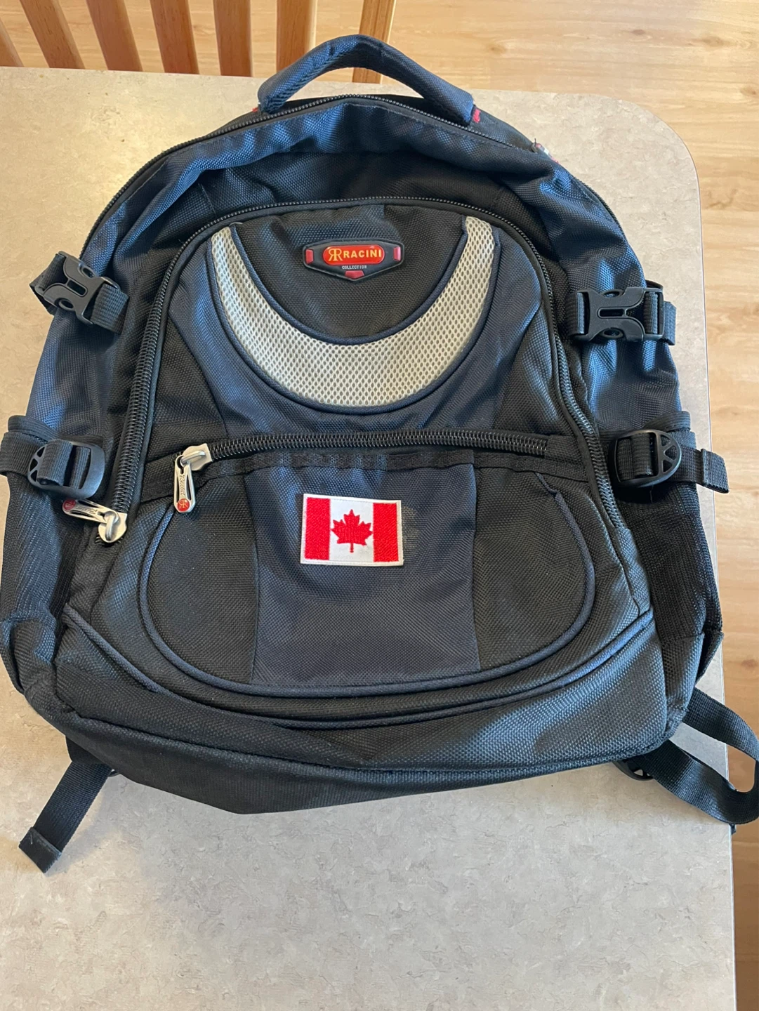 R Racini Collection Black Backpack with Canadian Flag Patch