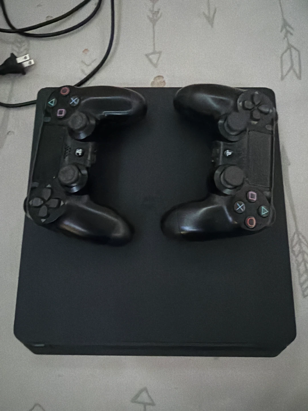 Sony PlayStation 4 Console with Two Controllers