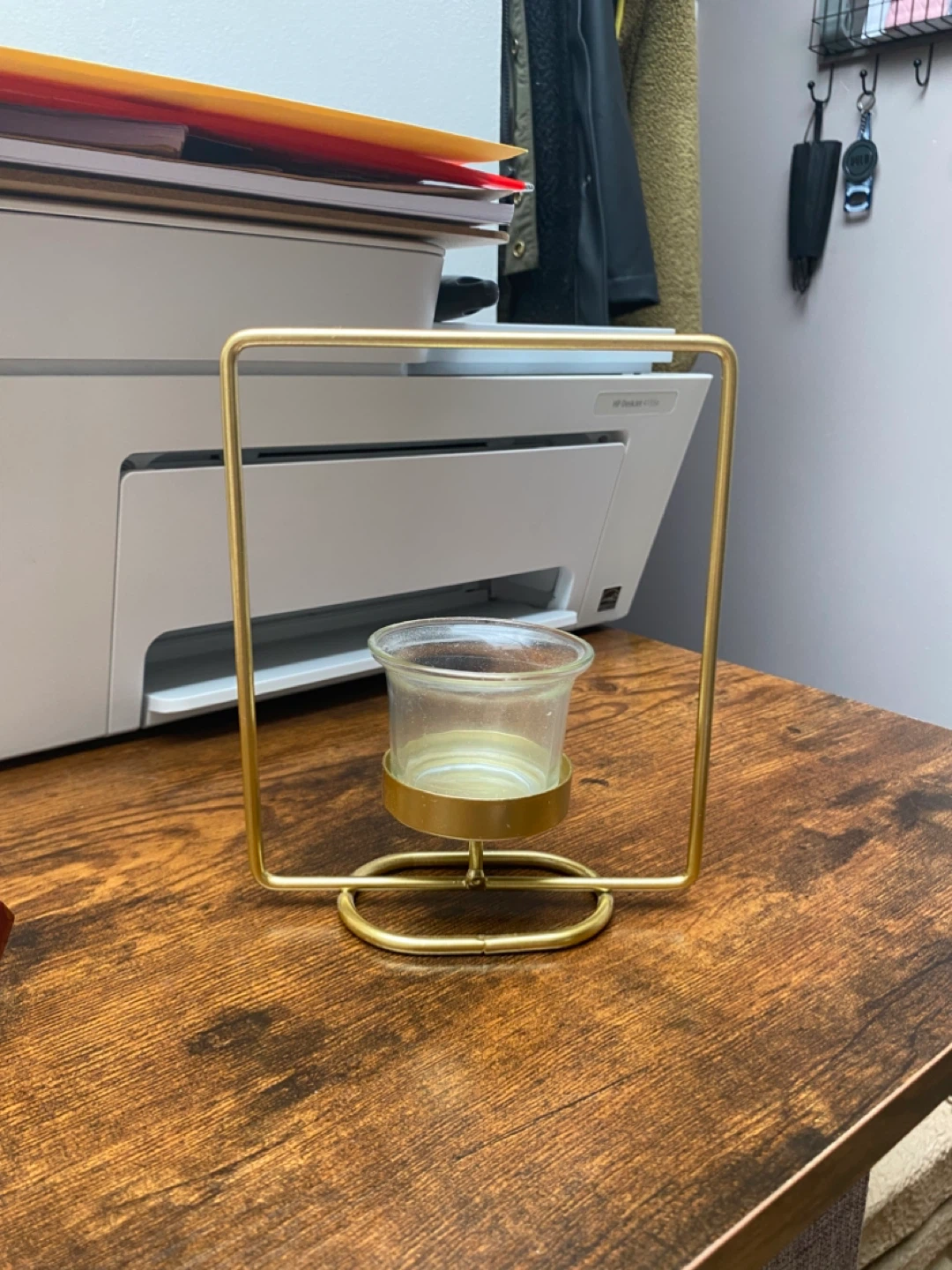 Gold metal and glass votive candle holder