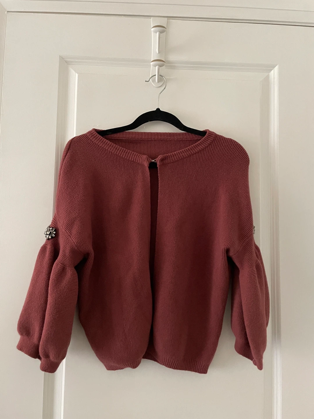Rose coloured cardigan with jewelled sleeve details