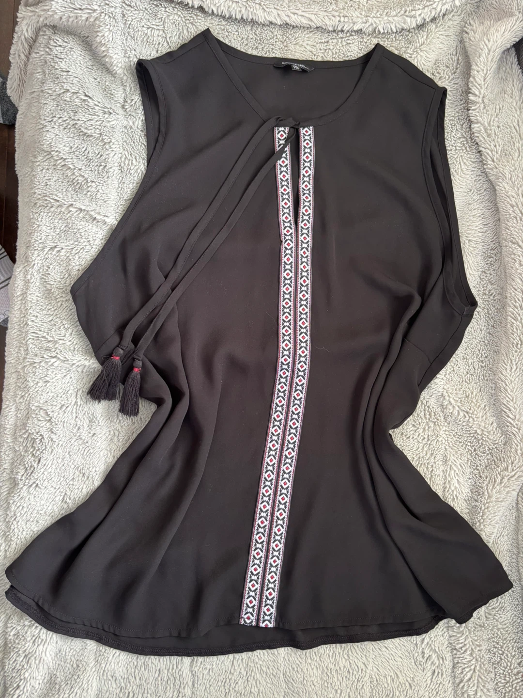 Black sleeveless top embroidered