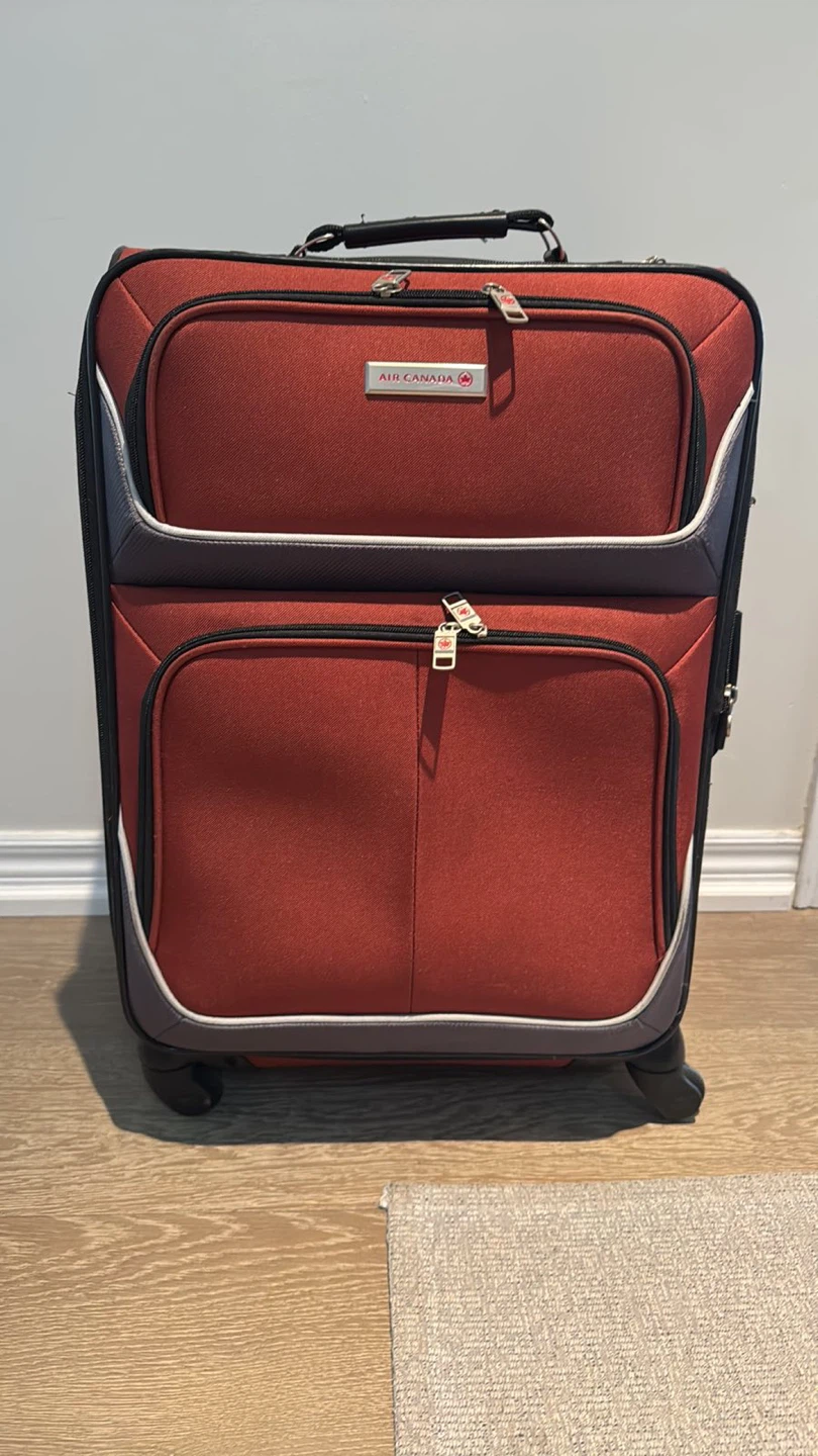 Air Canada Red Rolling Suitcase