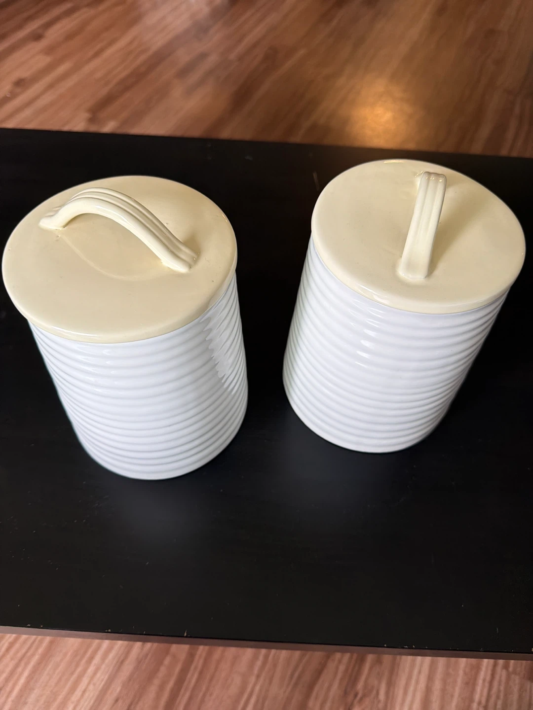Set of 2 White Ceramic Canisters with Yellow Lids