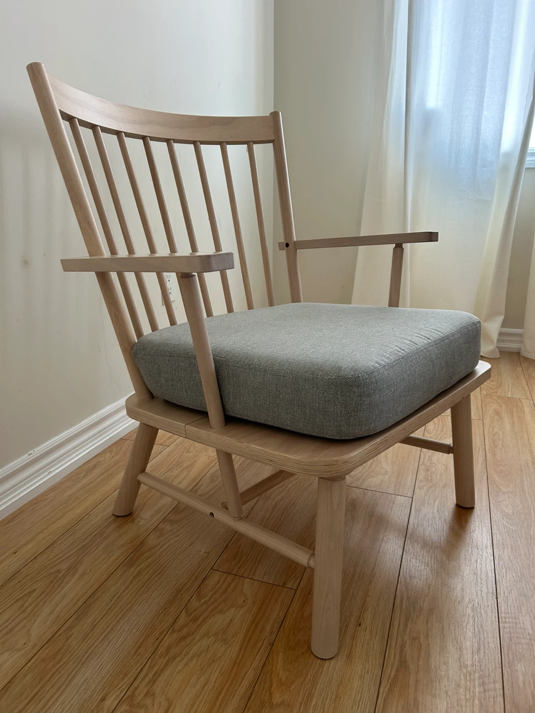 IKEA-Wooden armchair with grey cushion
