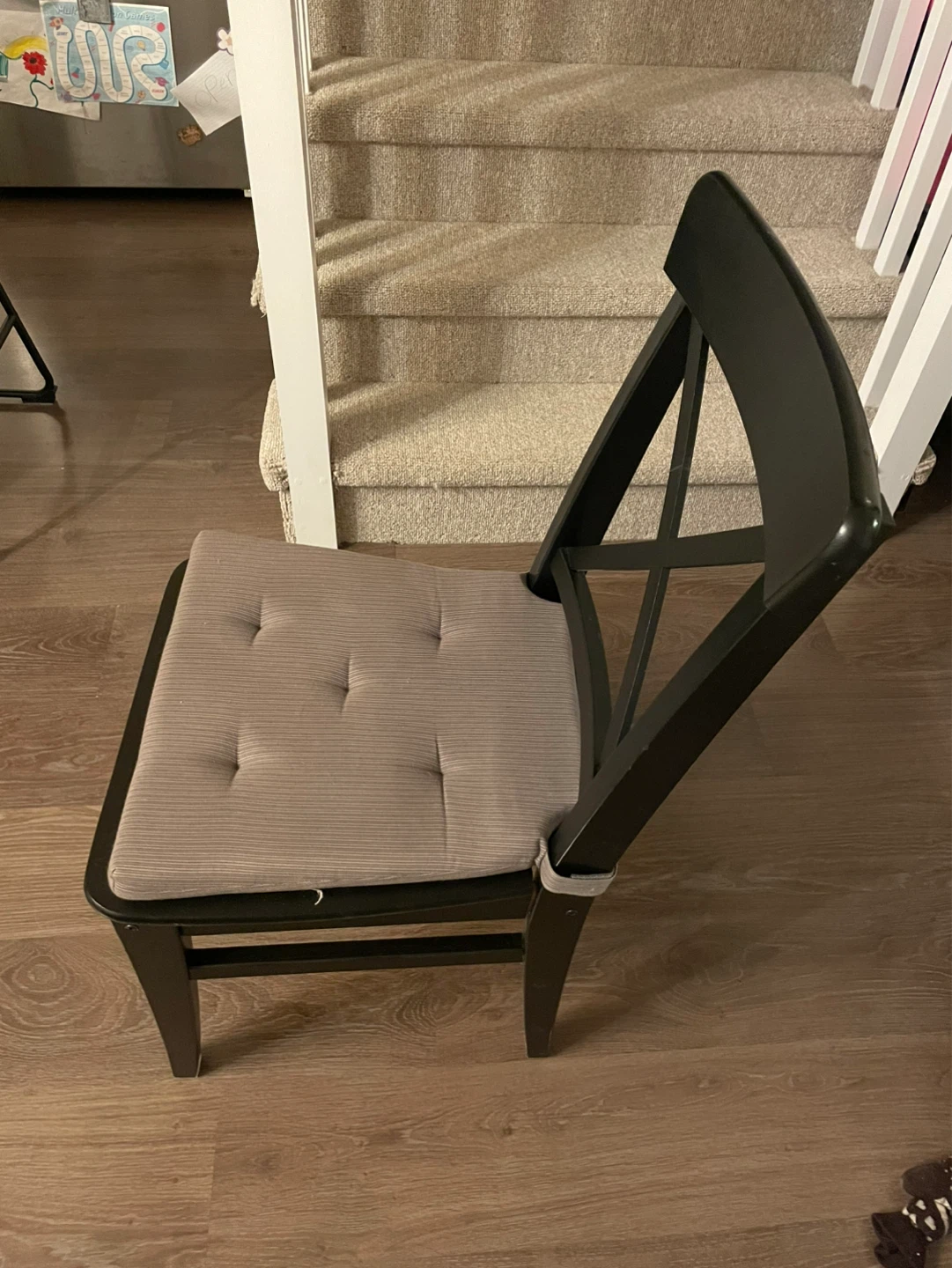 Two Black Wooden Dining Chairs with Padded Seat
