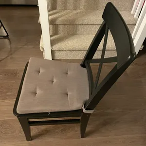 Two Black Wooden Dining Chairs with Padded Seat