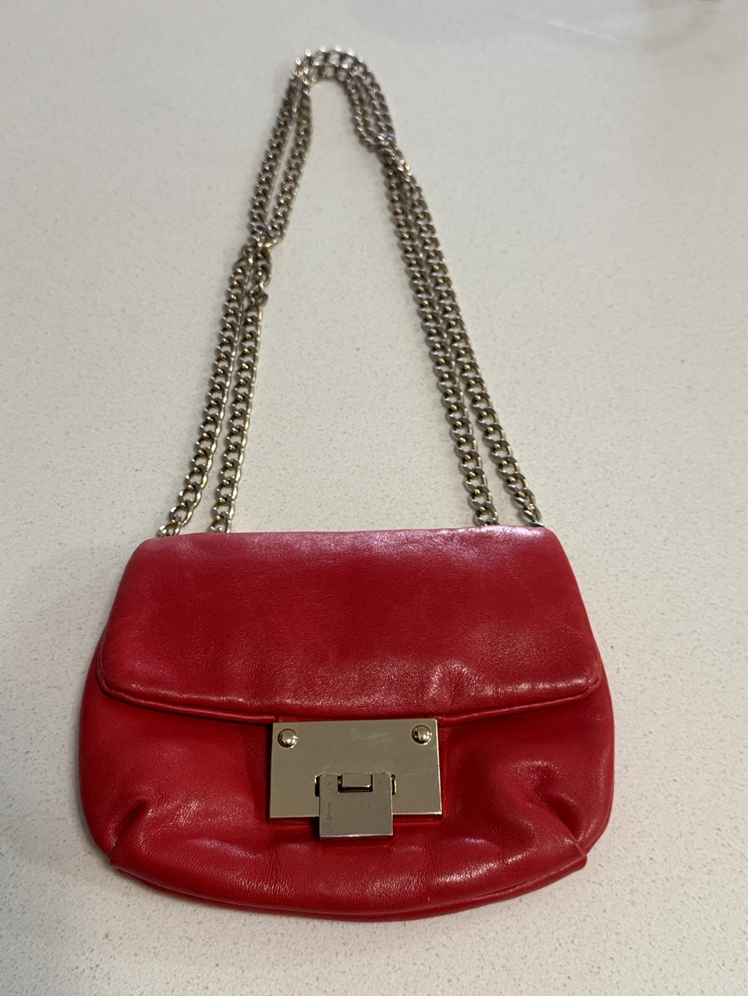 Brown’s couture red leather small crossbody