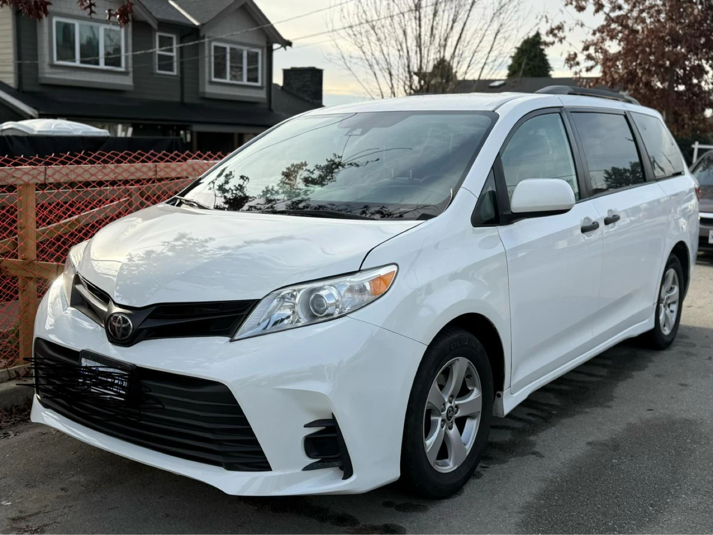 White Toyota Sienna Minivan