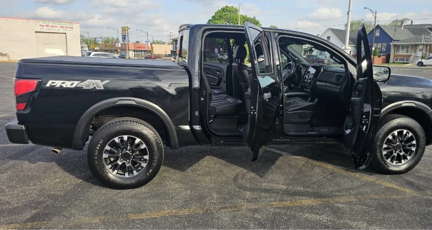 Black Nissan Titan PRO-4X Crew Cab Pickup Truck