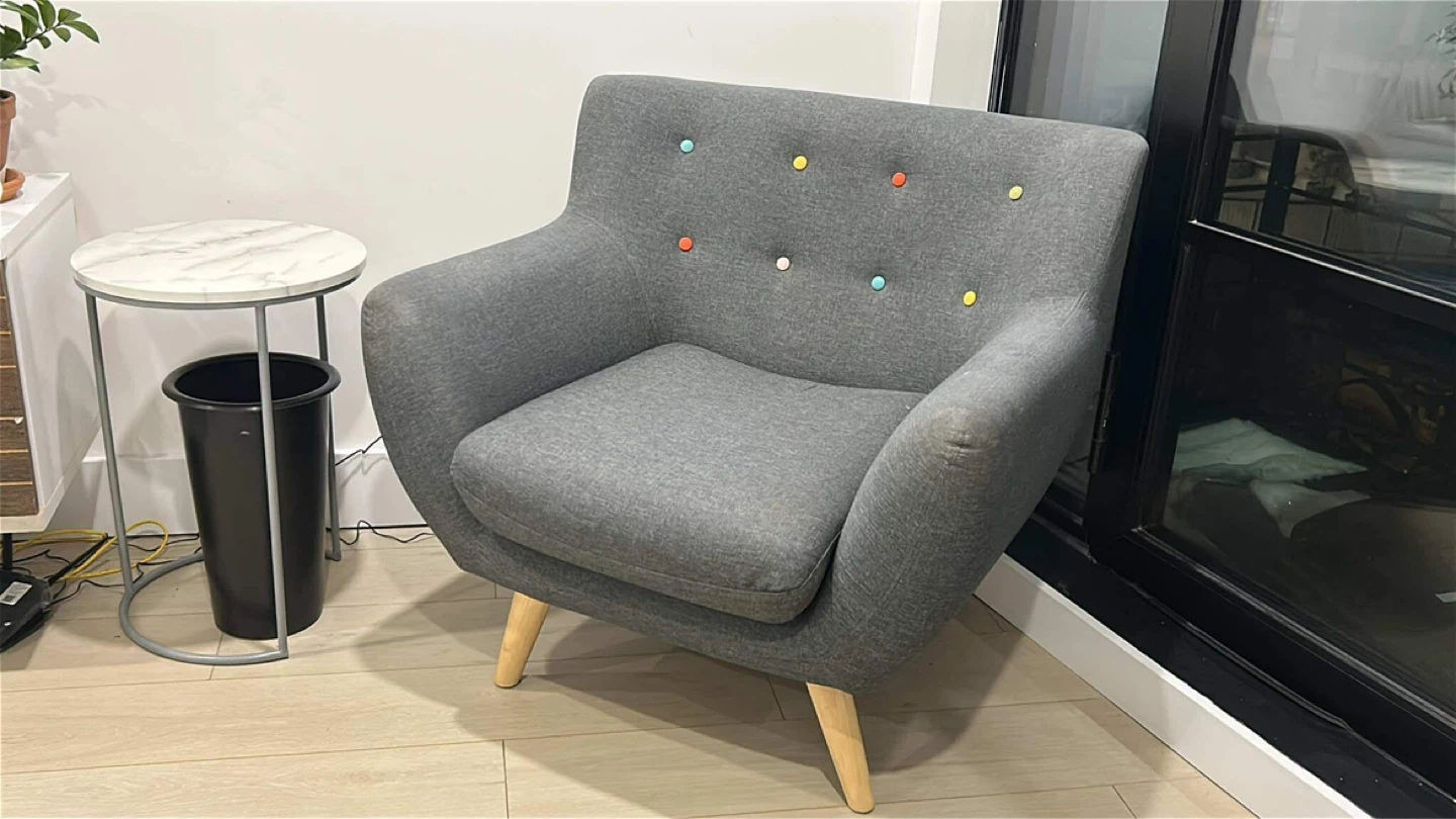 Gray Accent Chair with Colorful Buttons
