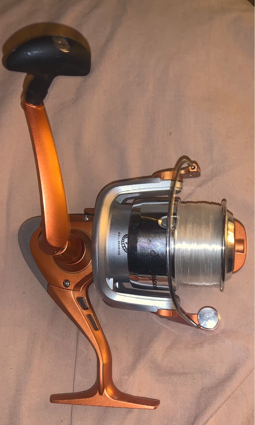 Shakespeare Fishing Reel - Orange and Silver