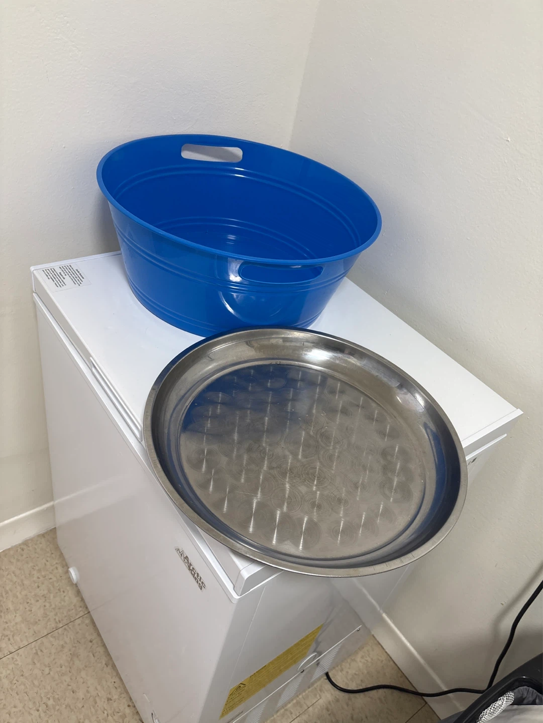 Blue plastic tub and large metal tray