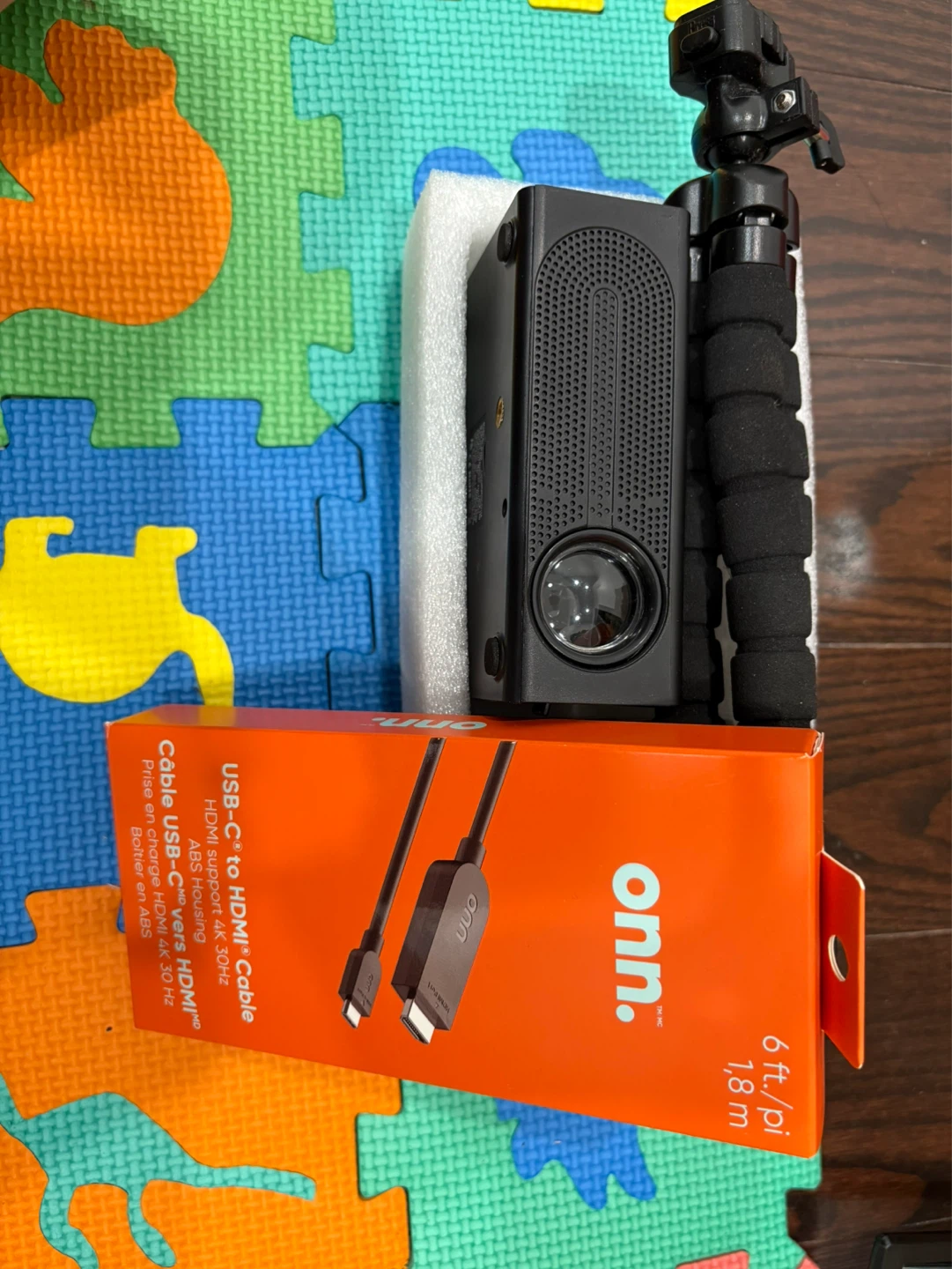 Portable Mini Projector with Tripod and Onn.USB-C Cable