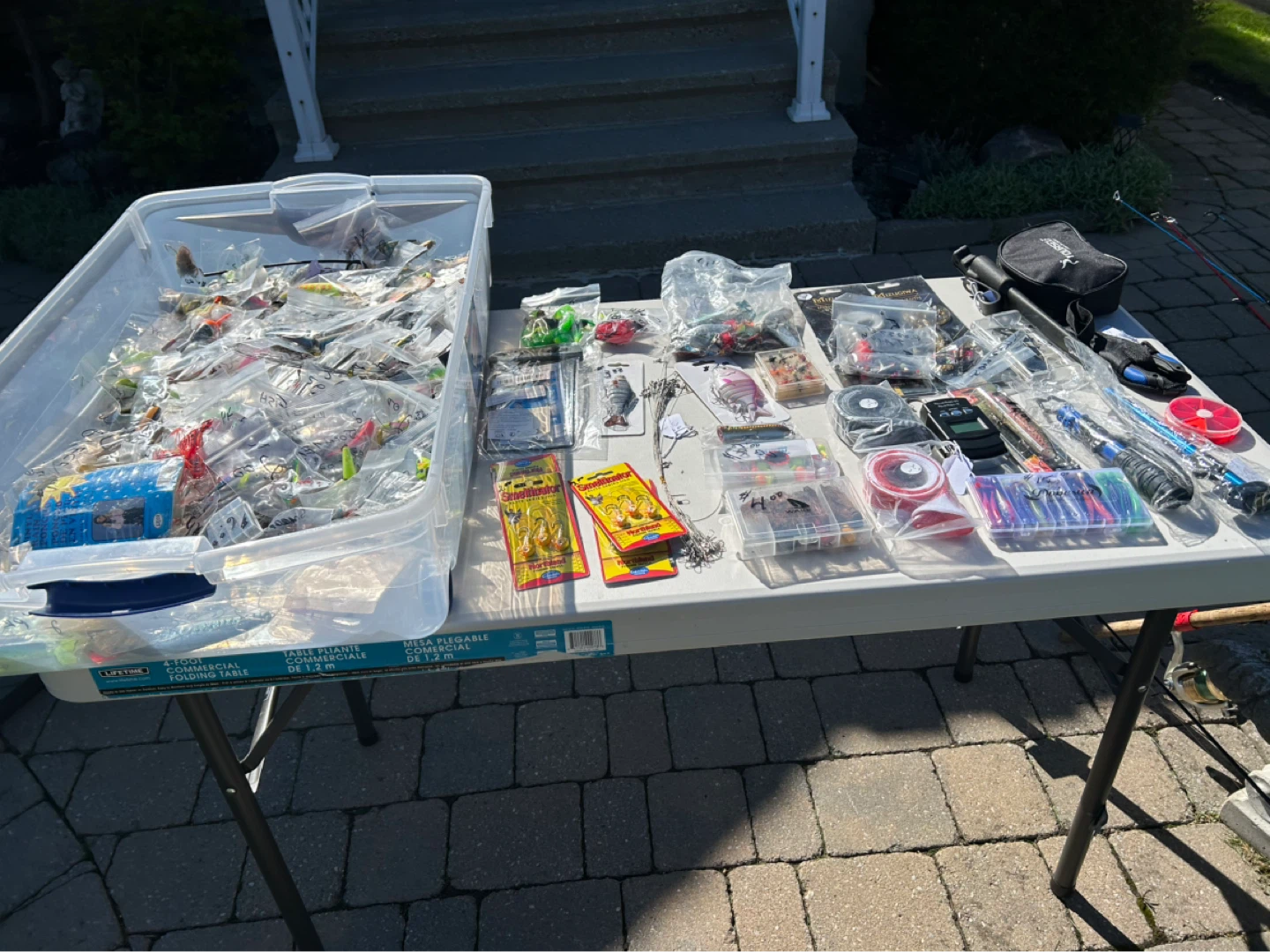 Fishing Rods and Tackle Assortment