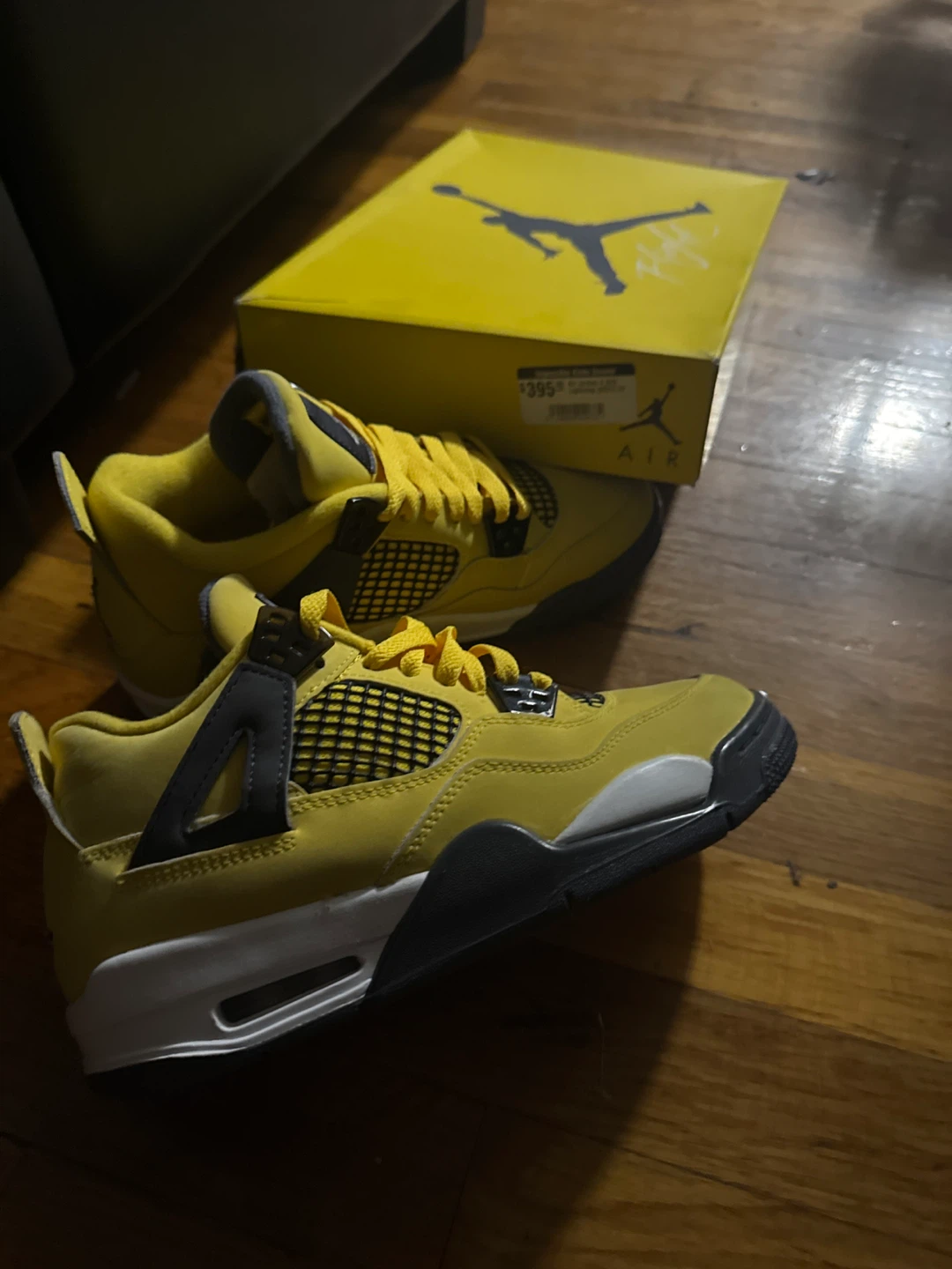 Air Jordan 4 "Lightning" Yellow Sneakers