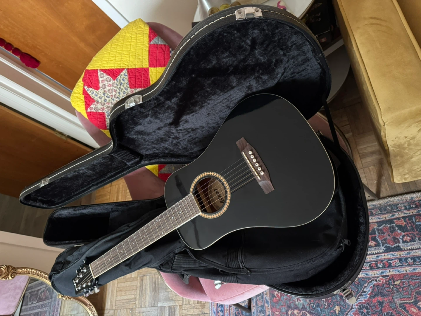 Black Acoustic Guitar with Hard Case and Accessories