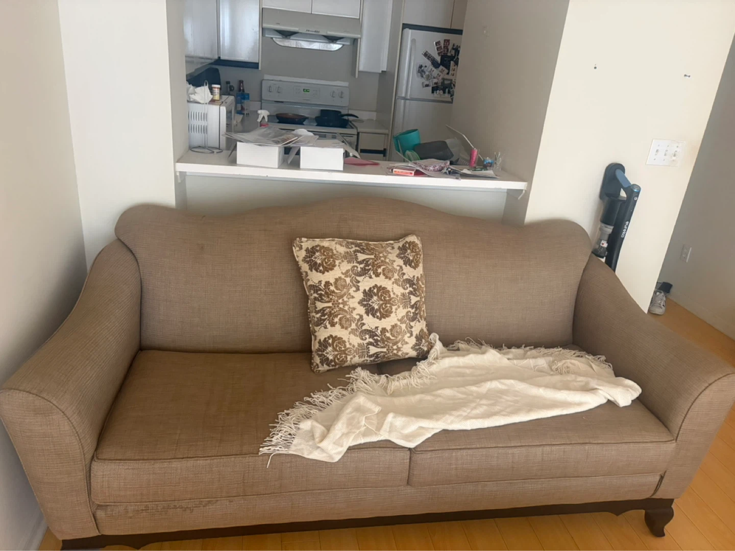 Brown Sofa with Decorative Pillow