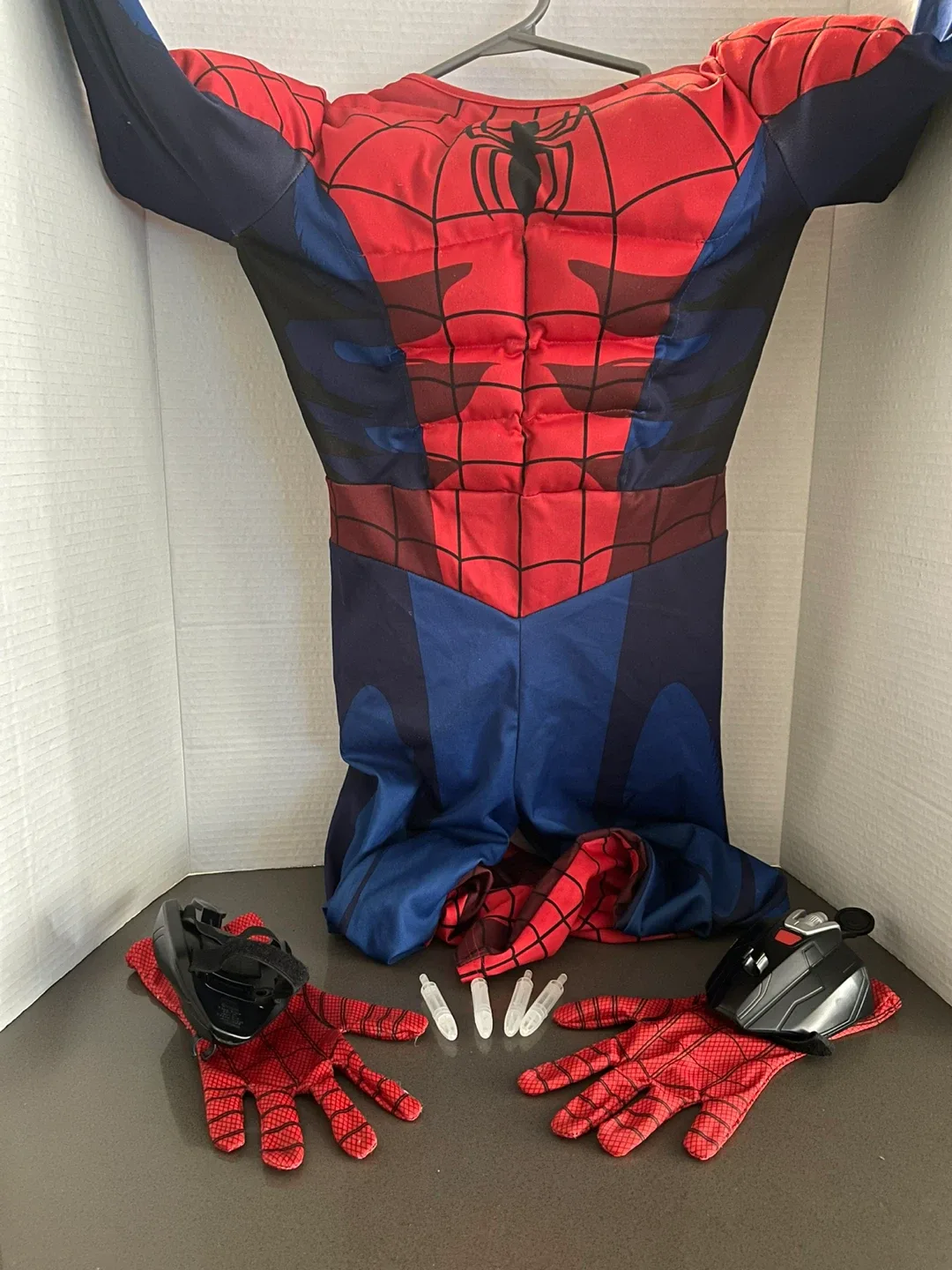 Kid’s Spiderman costume with “webshooters”