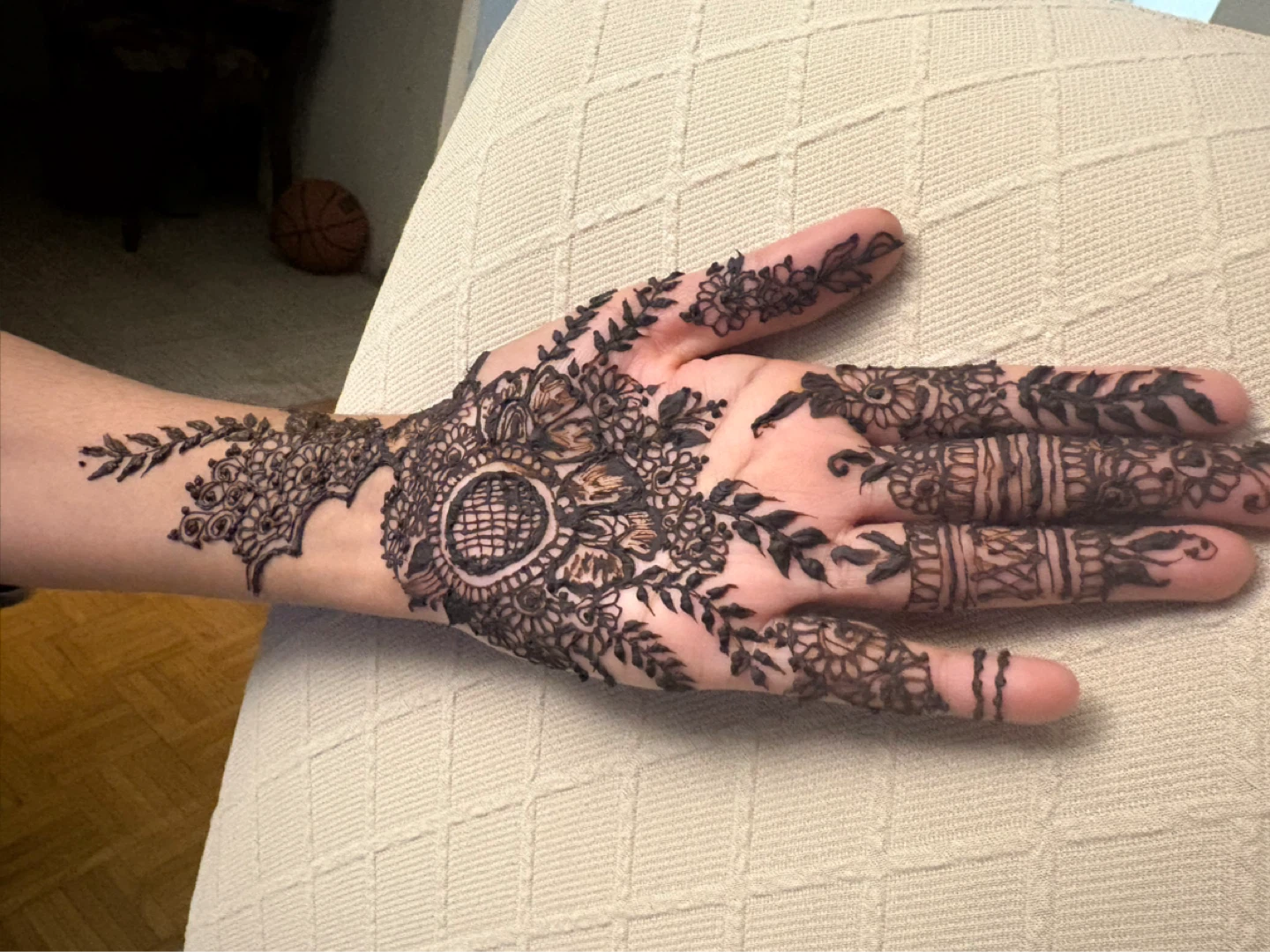 Intricate Henna Design on Hand and Arm