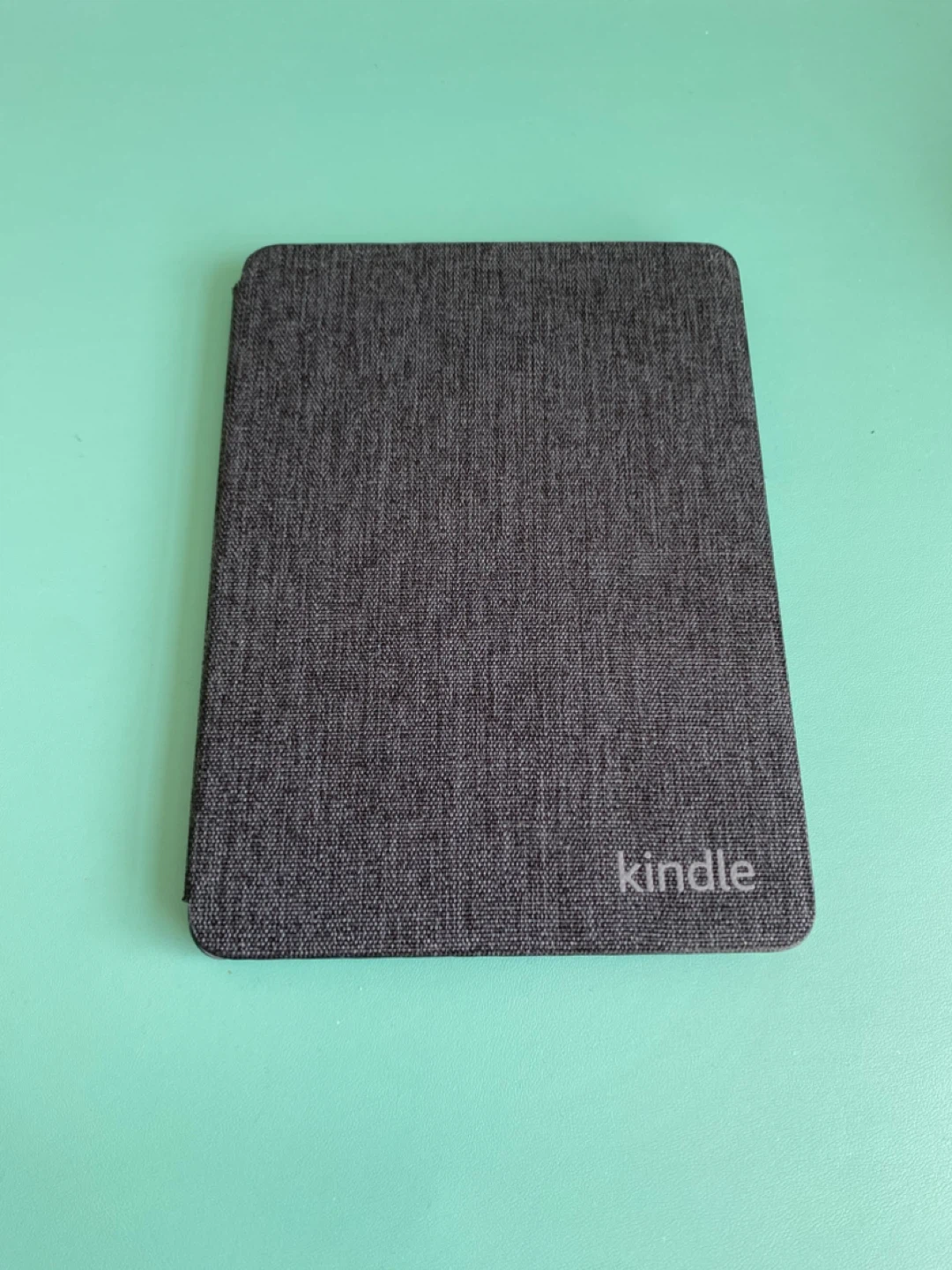 Amazon Kindle e-reader with cover