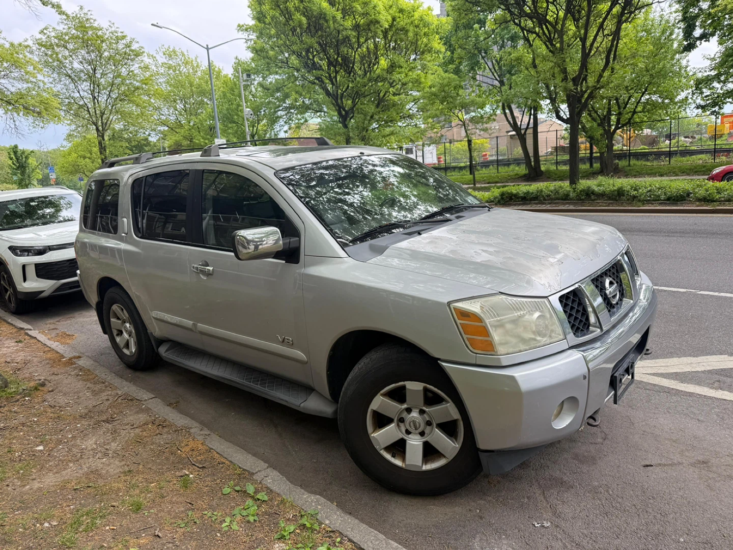 Silver Nissan Armada V8 SUV