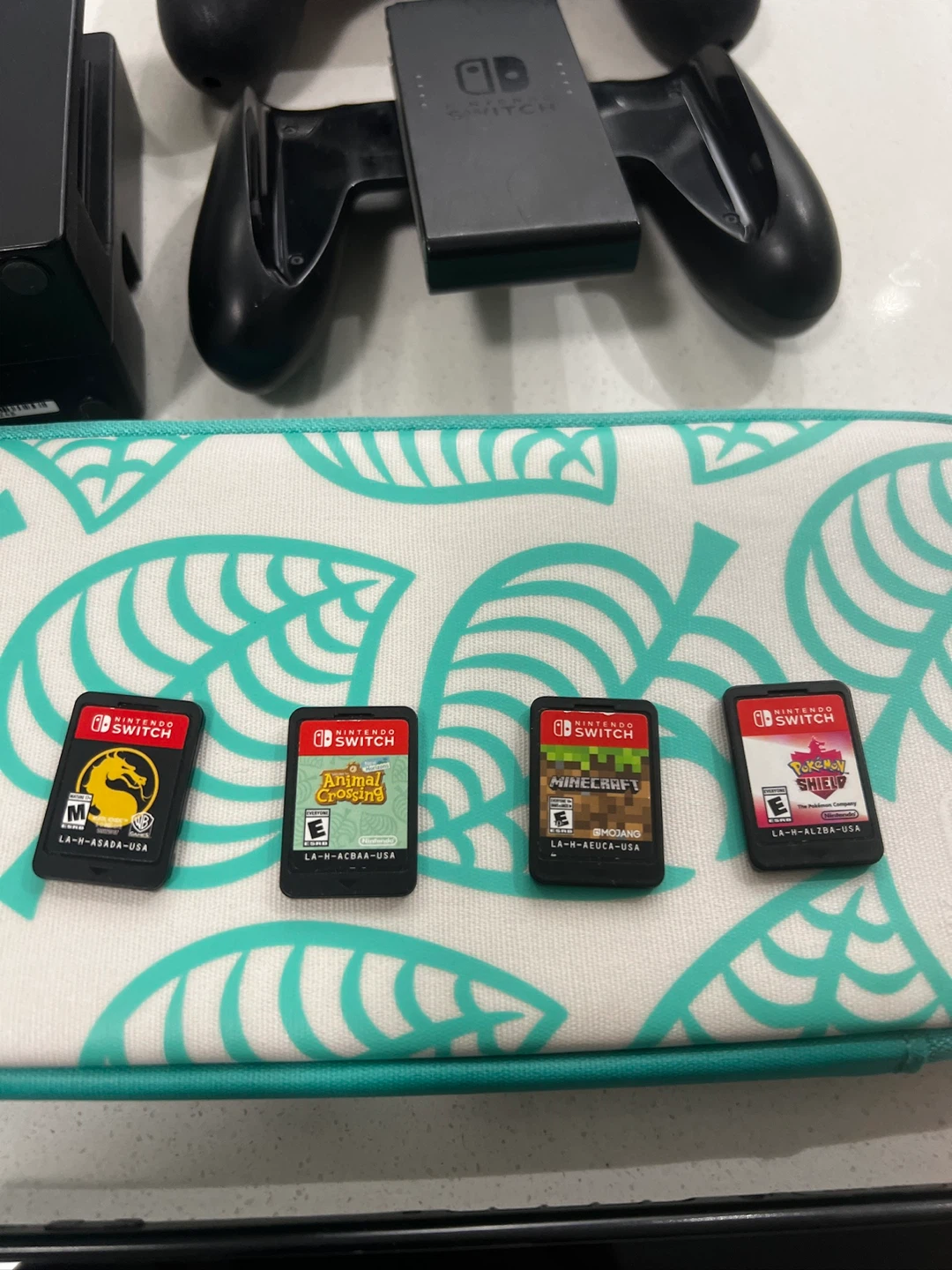 Nintendo Switch Console with Games and Accessories - photo 4