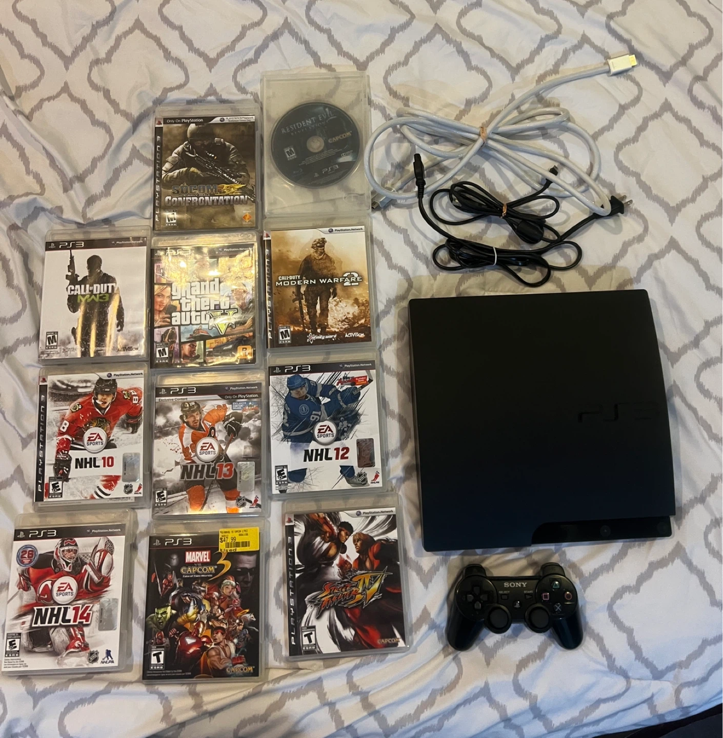 PlayStation 3 Console with Games and Controller
