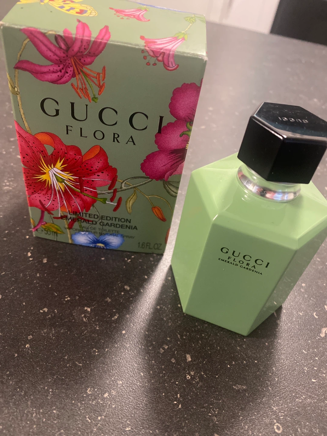 An Empty Bottle of Gucci Flora Emerald Gardenia
