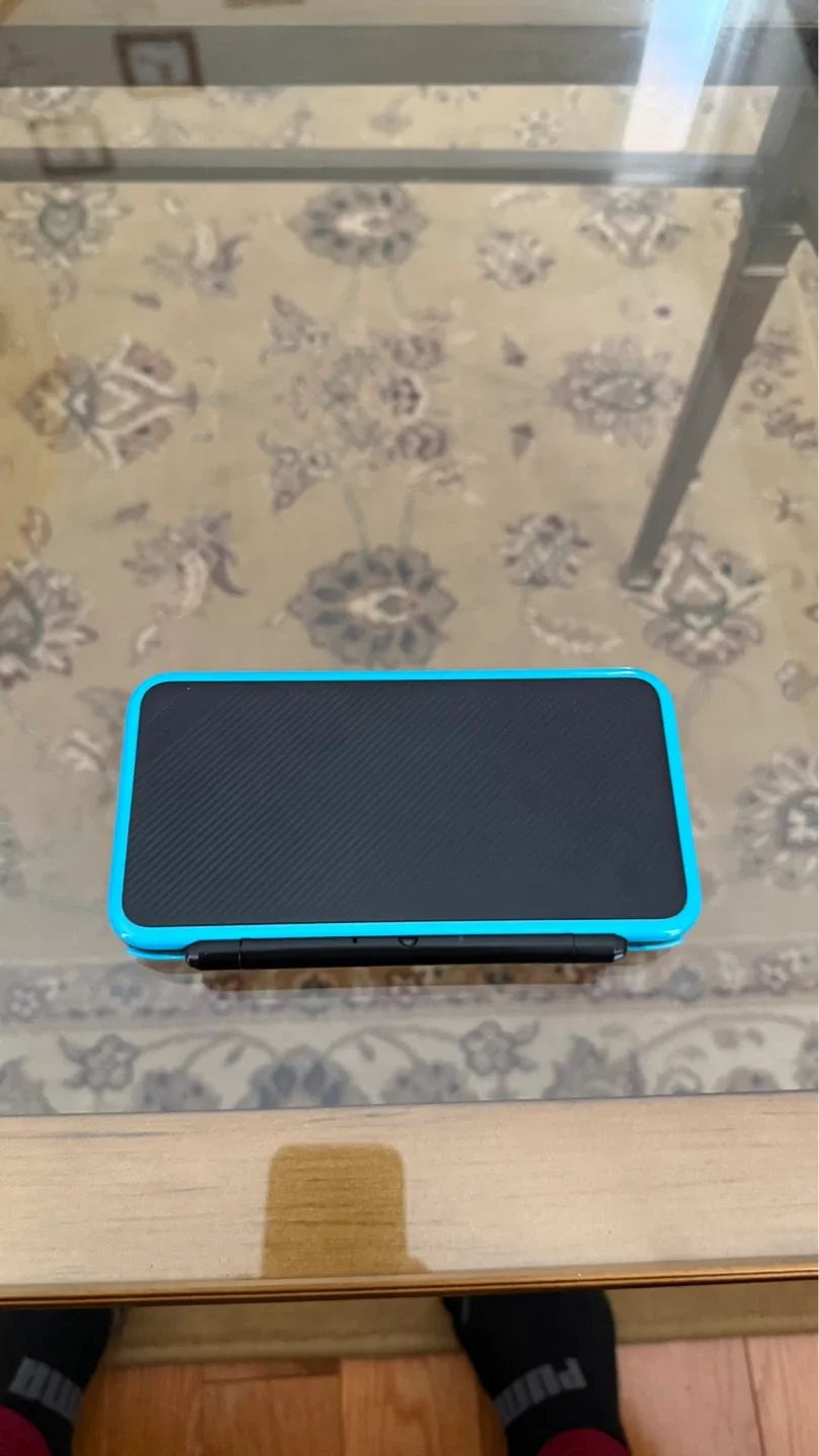 Nintendo 2DS XL with Pokémon Sun game
