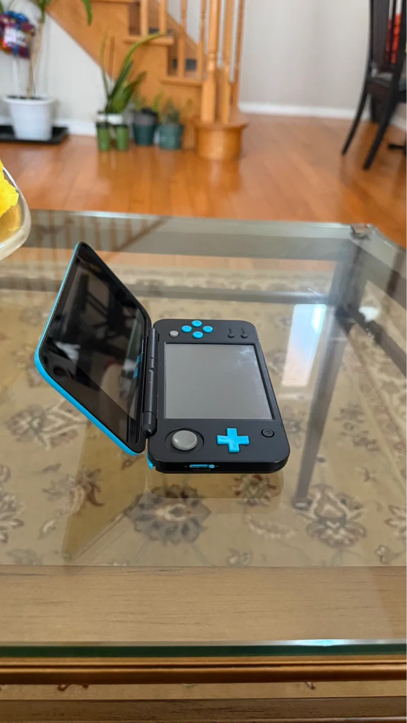 Nintendo 2DS XL with Pokémon Sun game - photo 2