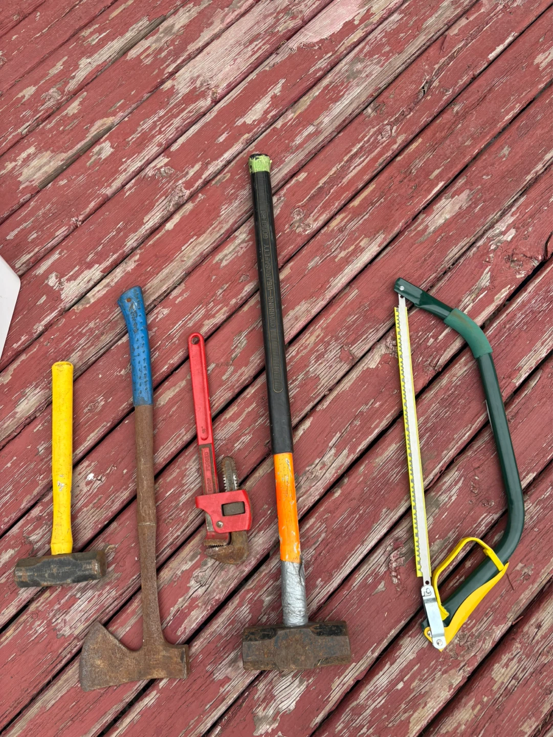 Assorted Hand Tools: Sledgehammer, Axe, Pipe Wrench, Saw