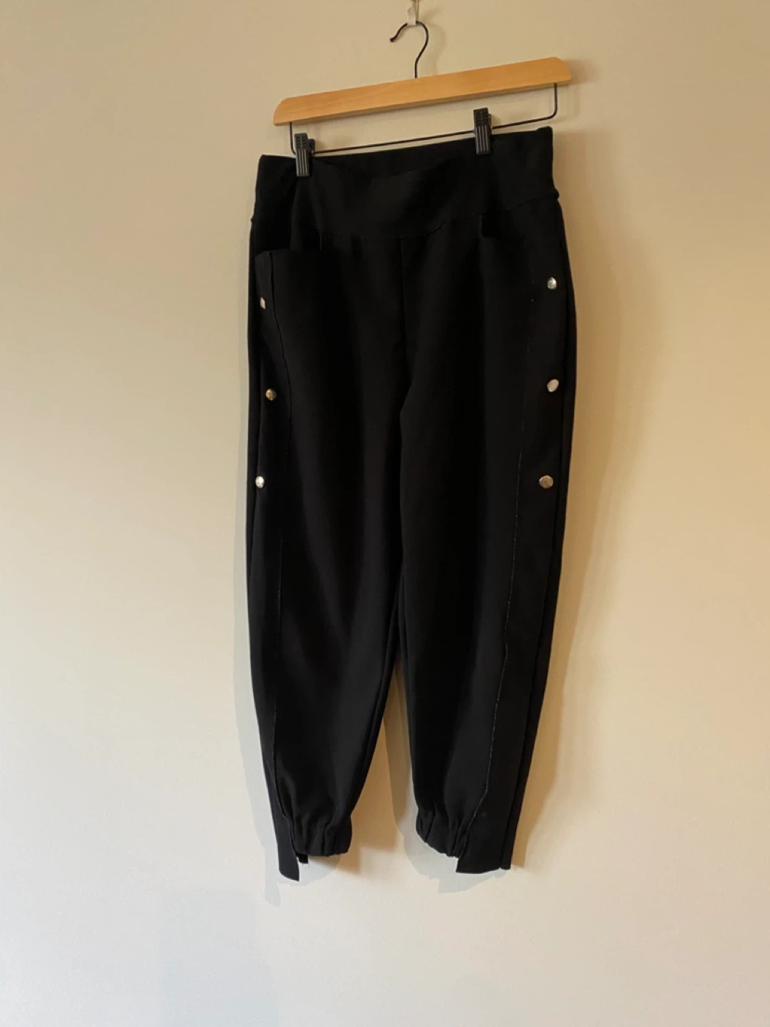 Designer brand Black snap-button trousers