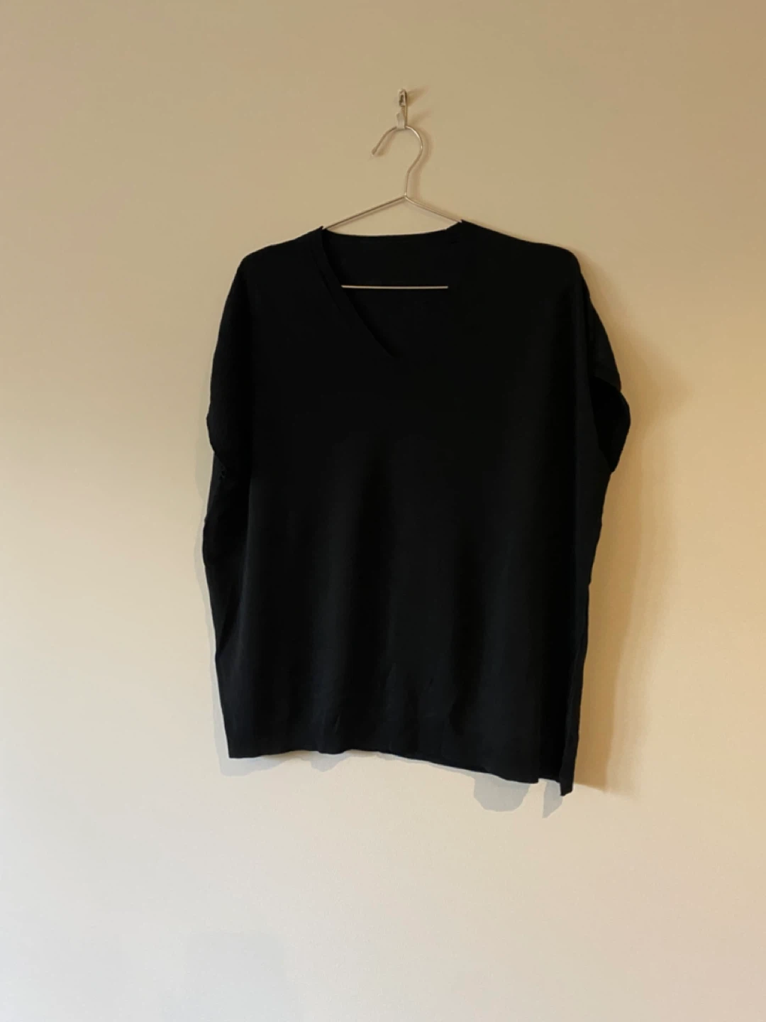 Black V-neck knit