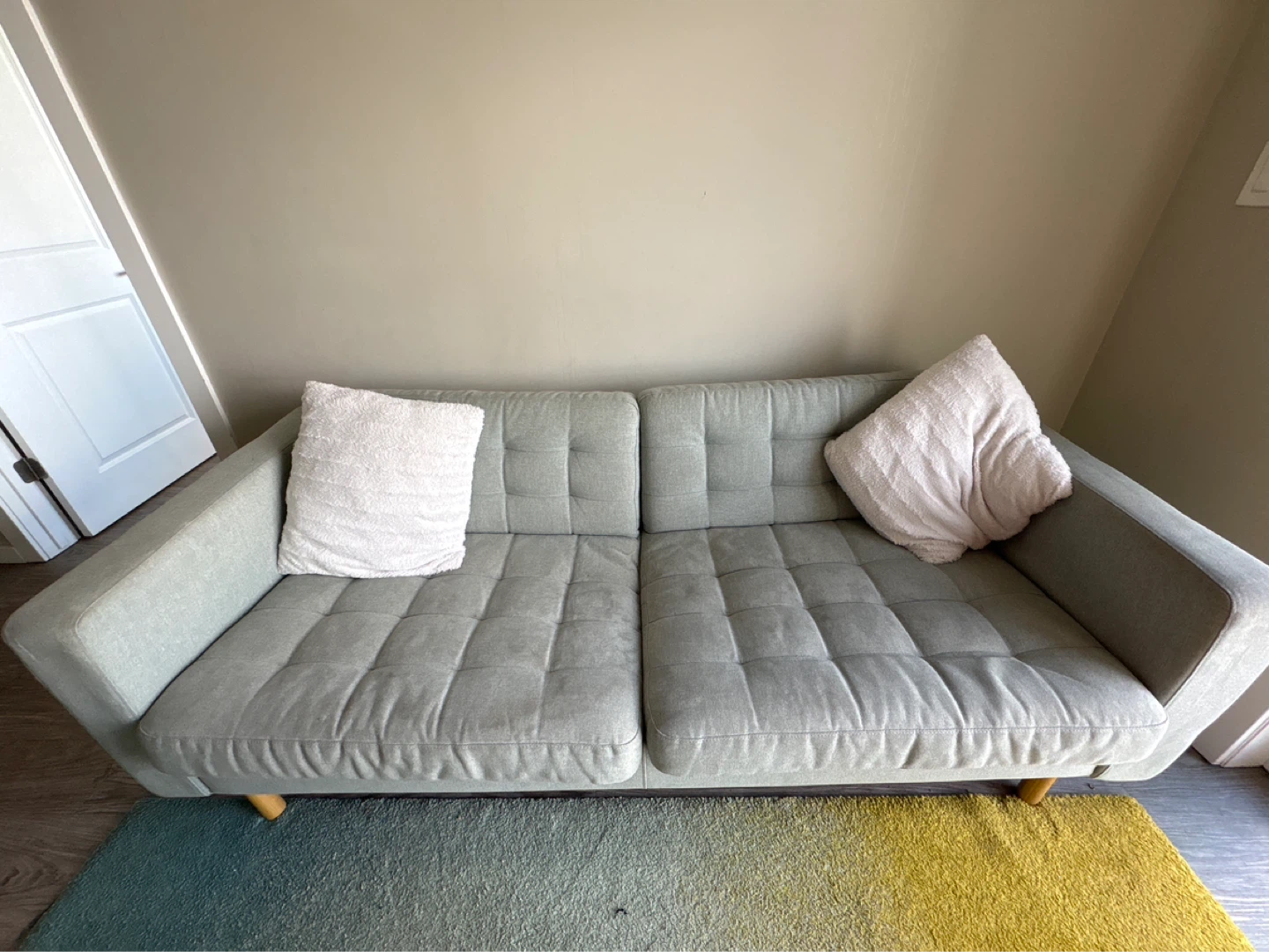 Light Green Tufted Sofa with Accent Pillows