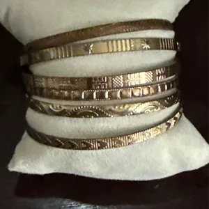 Set of 7 Gold Tone Engraved Bangles