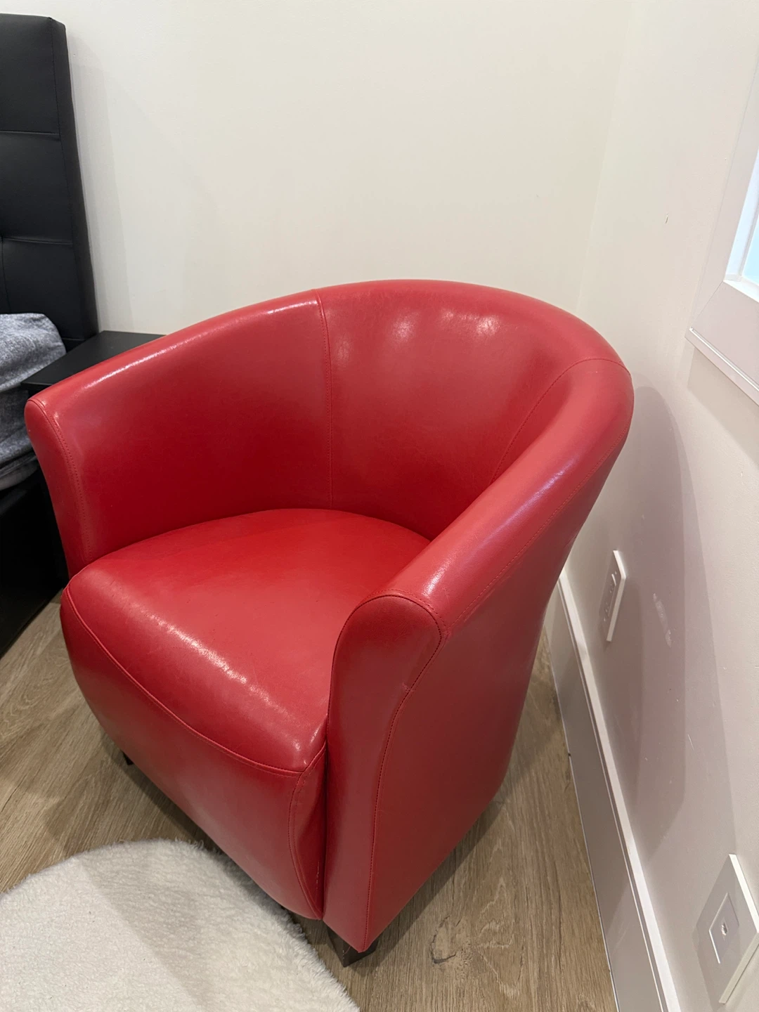 Red Faux Leather Accent Chair and floor mat