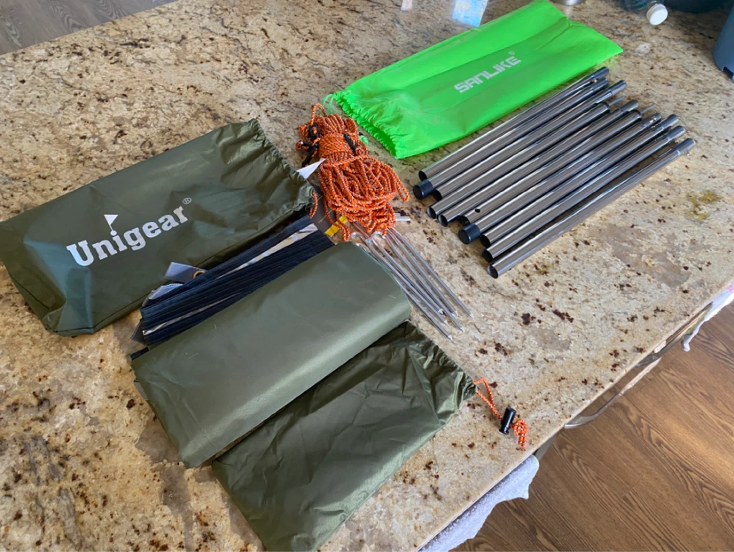 Brand new Unigear Camping Tarp + Sanlike Adjustable Poles Set