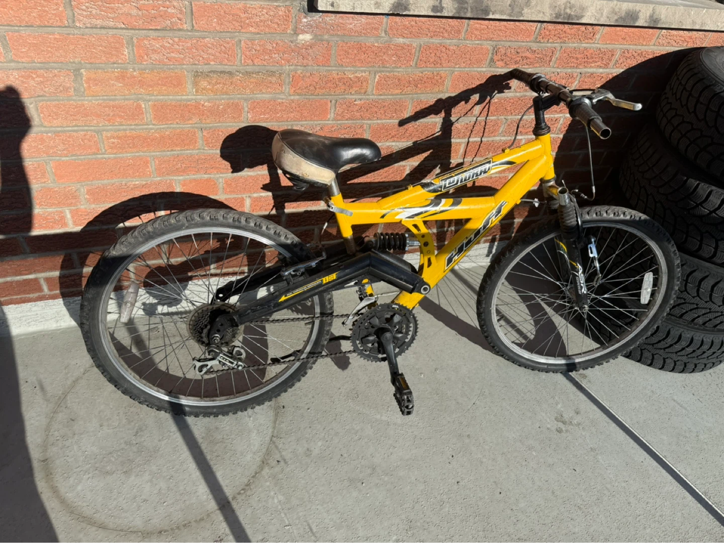 Yellow Schwinn Full Suspension Mountain Bike
