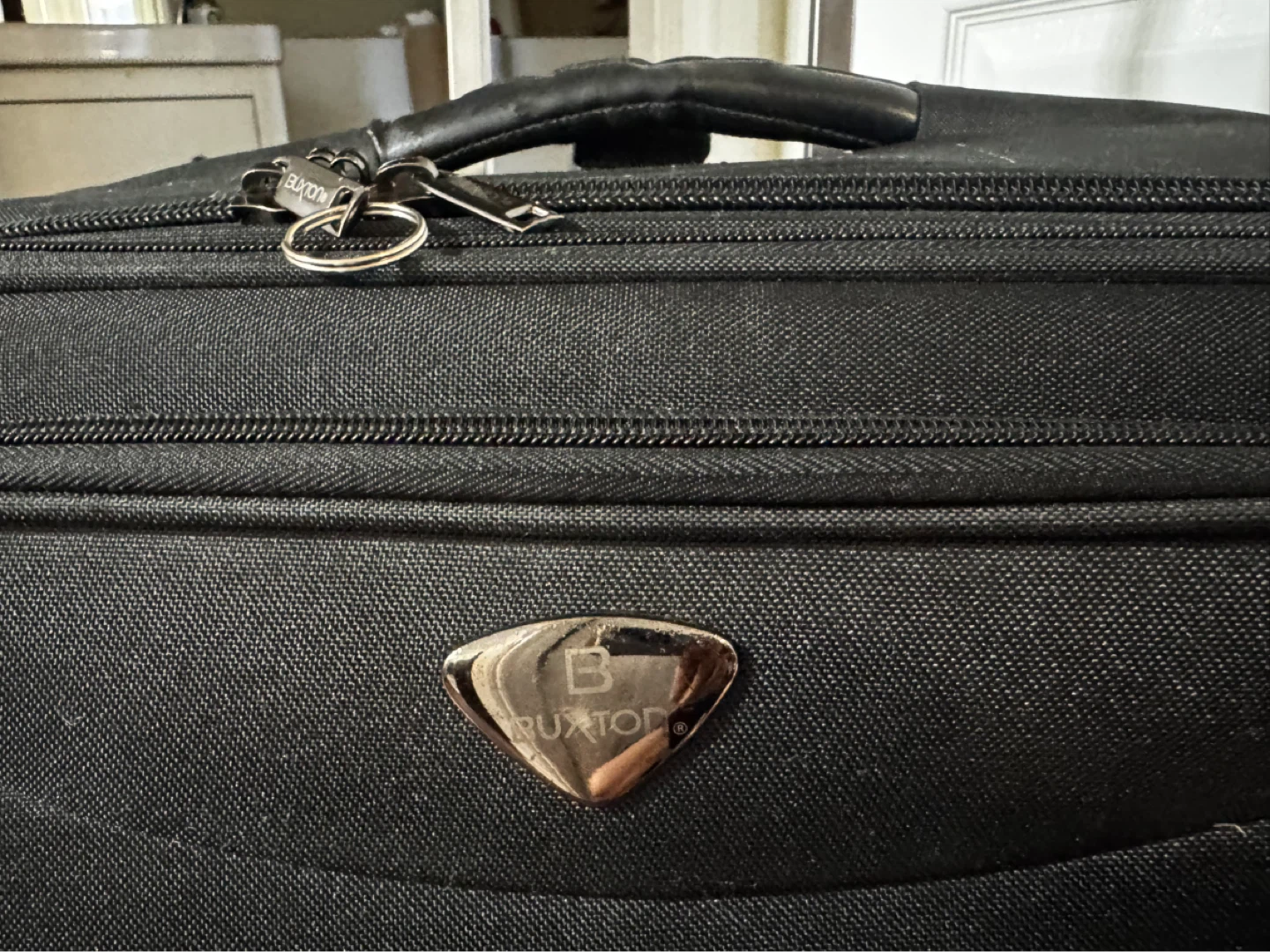Buxton Black Rolling Suitcase - photo 3