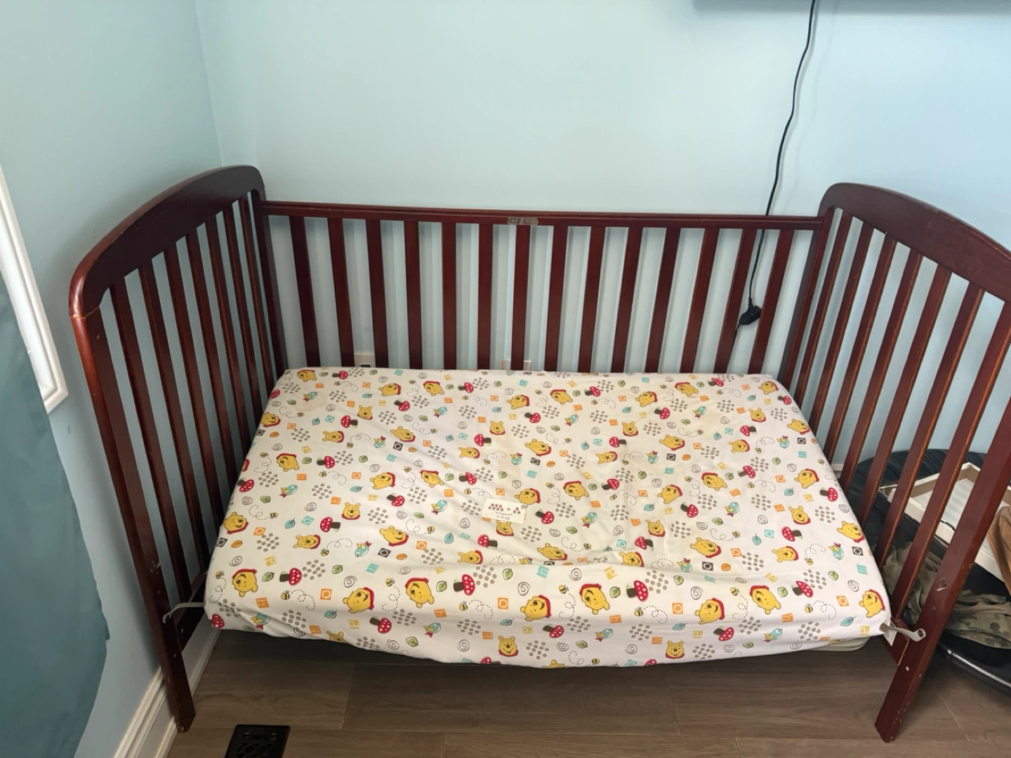 Dark Wood Baby Crib with Winnie the Pooh Mattress - photo 2